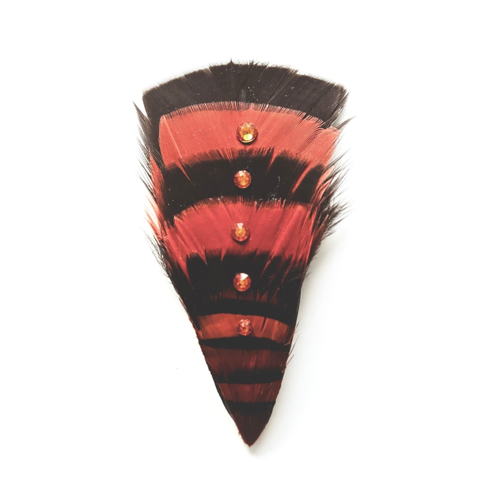 Handmade brown and burnt orange feather hair clip with striped feather layout and fine crystal sheen, perfect for warm-toned evening styling by Nicole Ho.