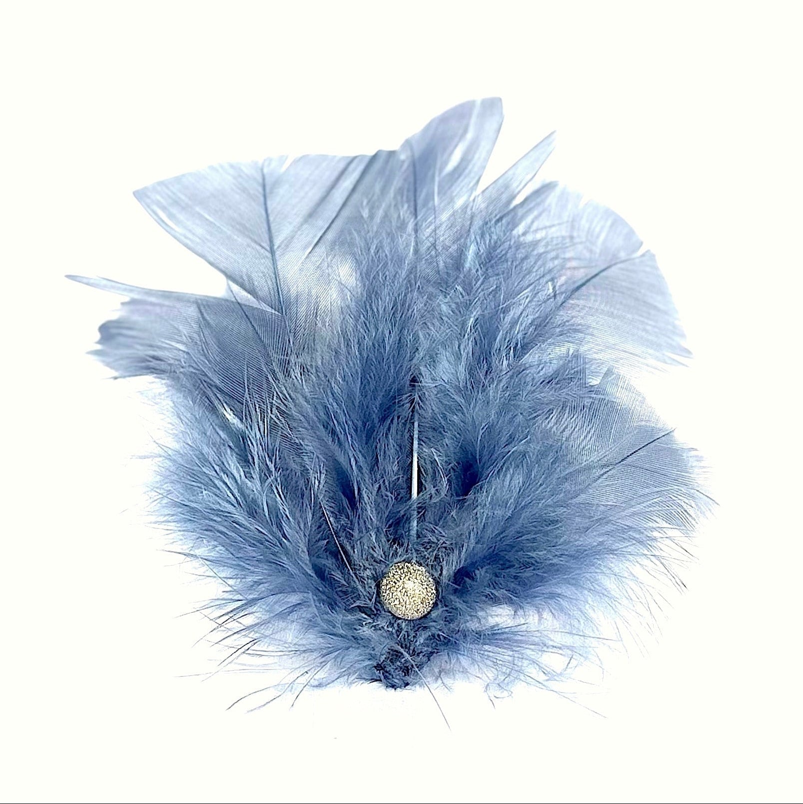 Handmade light-blue feather hair clip with silver bead accent by Nicole Ho London.